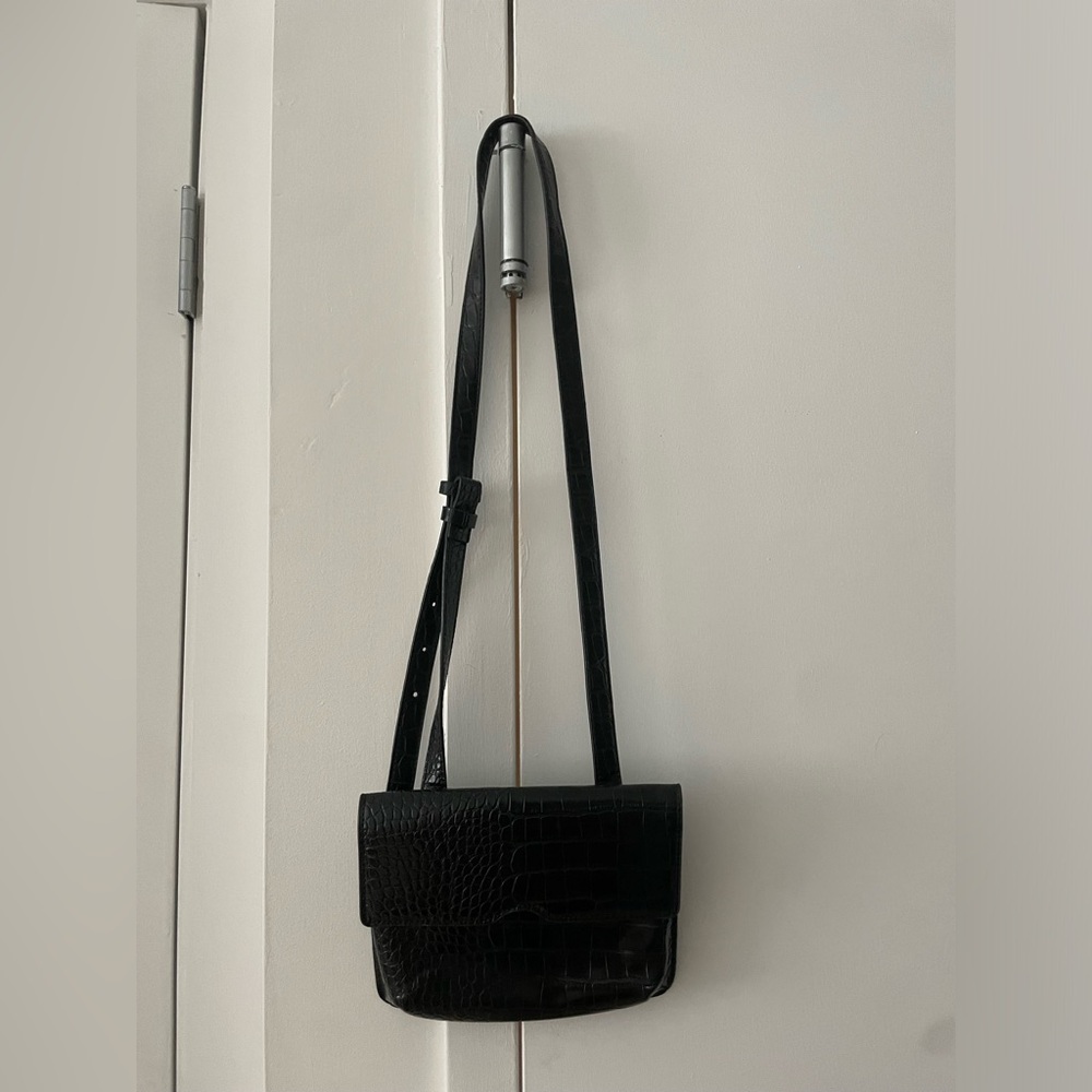 Simple vegan black leather snake bag